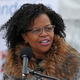 Kim Janey, President, Boston City Council, speaks at the podium during the topping off event in Boston on Feb. 23, 2021.
